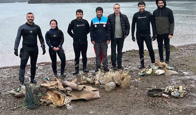 Muğla’da yağmur altında deniz dibi temizliği